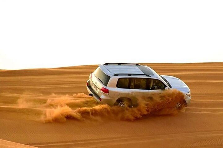 Experience the rush of dune bashing in Dubai's stunning desert landscape. Navigate the sandy waves in a powerful 4x4 and create unforgettable memories of adventure and excitement.